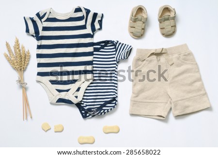 top view fashion trendy look of baby clothes and toy stuff, baby fashion concept
