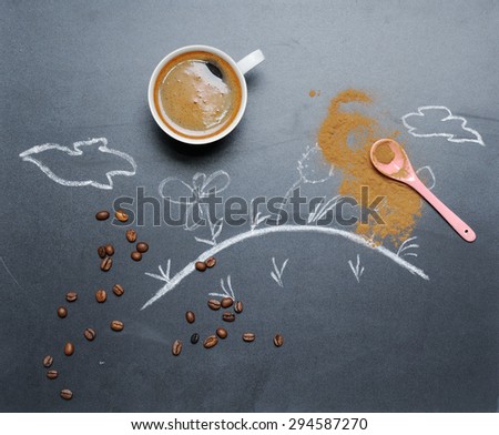 mug of coffee with happy drawing on the blackboard from the top view, happy morning concept