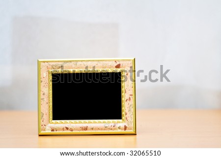 Picture frame with golden border and blank space for your image.