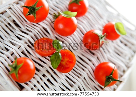 Bunch of cherry tomato and basil, traditional Italian.