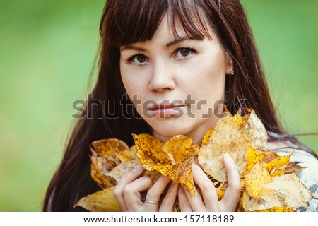 Photo of beautiful pretty brunette woman, fall season concept