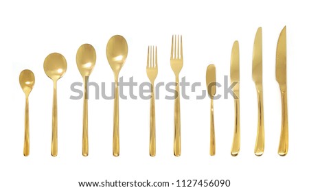 Gold New Spoon Fork Knife Cutlery Set. Modern Style Gloosy and Shiny. Die cut isolated on White background with Clipping path.