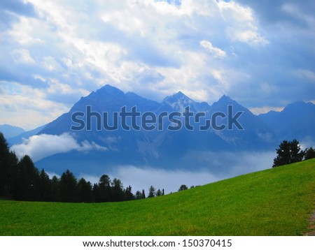 Above the clouds in the Engadine valley, Switzerland