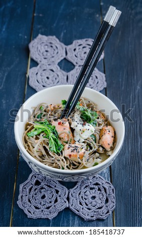 Chinese soba noodles with fish and spinach