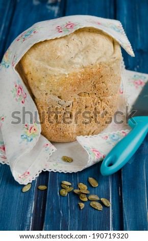 Bread from bread making machine  on a wooden table