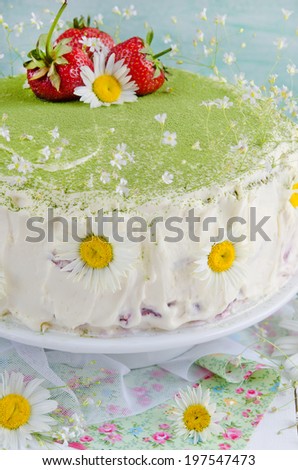 Sponge cake with strawberries and tea Match