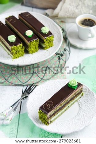 Opera cake with  green tea match and cofee