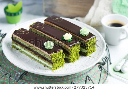 Opera cake with  green tea match and cofee