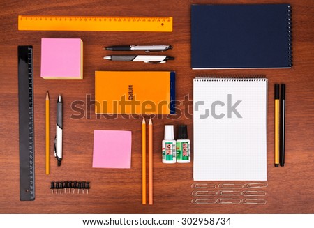 Office desk with glasses pen pencil ruler and other office items