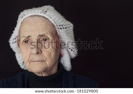 Portrait of a sad old woman