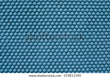 metal background with a round pattern