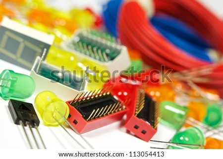 Background with components of electronics - LED, transistors, etc. Close-up