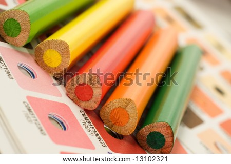 Coloured pencils with cmyk color bars