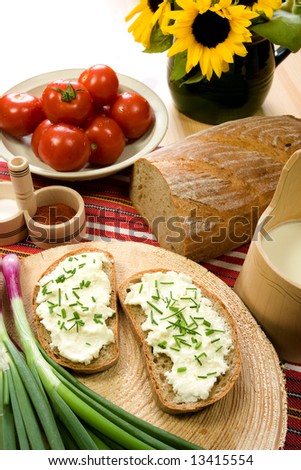 Healthy breakfast / cotage cheese, red onion, tomato, buttermilk (žin?ica) and  slice of bread