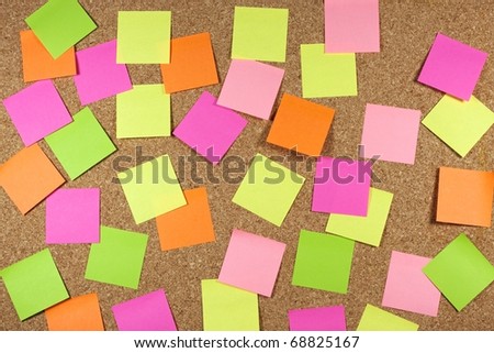 Cork board with colored sticky note