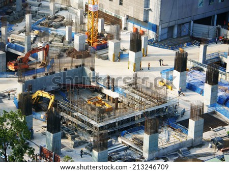 HO CHI MINH CITY, VIETNAM- AUG 21: Panaroma of construction work at Asia city, steel rod rise up from concrete pillar, development of real estate make increase construct industry, Vietnam, Aug 9, 2014