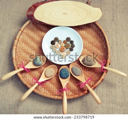 Nice concept with idea of menu for love, heart shape from wooden button, spice of happiness on spoon, set on bamboo tray, art style for decor or blog