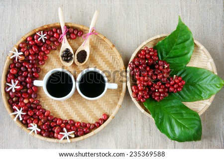 Collect of cafe, red ripe berries, roasted coffee bean, cup of black coffee, green leaf, white flower on bamboo basket,  amazing decor, harmony design for advertise