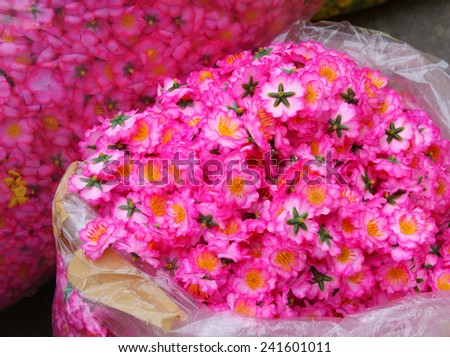 Colourful raw materiral decoration to decorate for house on New Year seasonal at Vietnam, Vietnamese like sakura blossom on Tet and use artificial flower to make beautiful for tree