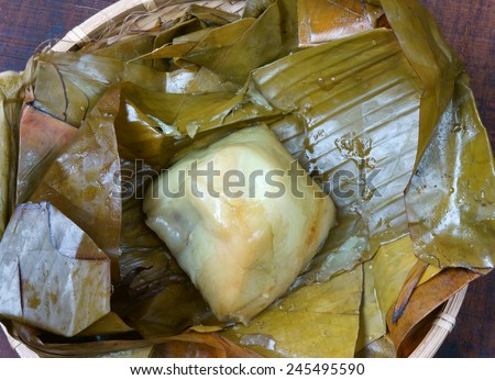 Vietnamese food, Banh Gio or pyramid shaped rice dough dumpling filled with pork, shallot, andÃ?Â wood ear mushroomÃ?Â wrapped in banana leaf, is delicious street food, dish make from rice flour