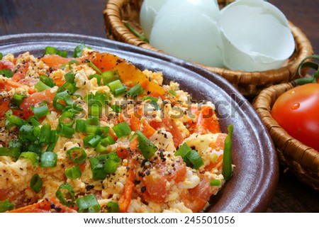 Vietnamese food, tomato saute egg, popular Vietnam food in Viet Nam meal, ingredient as egg, tomato, season with scallion, pepper, verry nutrition, cheap dish, for diet or vegeterian, anti cancer