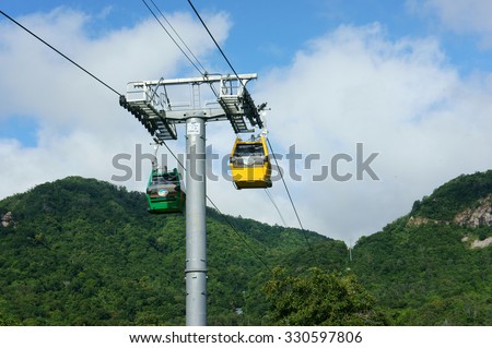 AN GIANG, VIET NAM- OCT 16: Nui Cam nature reserve, an tourist area near by Chau Doc, Mekong Delta, suspension cable system to transport traveler up to mountain, Angiang, Vietnam, Oct 16, 2015