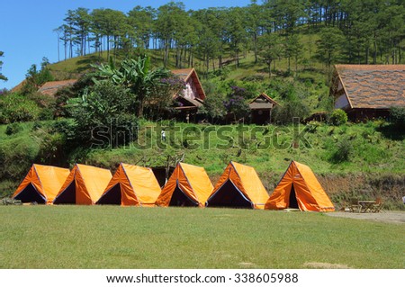 DA LAT, VIET NAM- NOV 9: Cu Lan village at Dalat countryside, hotel and holiday resort among pine jungle, camp on grass field, an eco tourism in nature reserse, Dalat, Vietnam, Nov 9, 2015