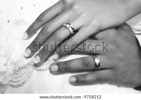 stock photo Bridal Couple showing of their wedding rings black and white