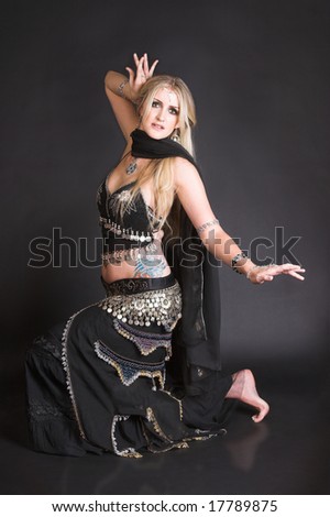Blond Belly Dancer in a belly dance position
