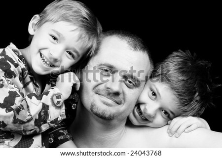 Father with his two sons, black and white filter