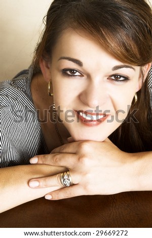 Beautiful adult female in casual attire with friendly expression