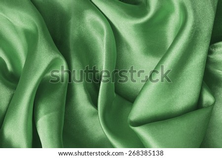 Texture green satin, silk background