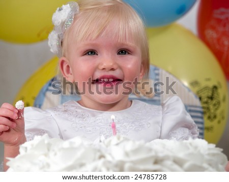 happy girl before cake for birth day