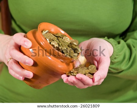 pot with money in hand