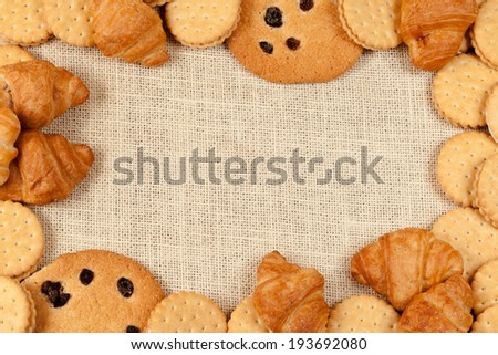frame of cloth, cookies and croissants