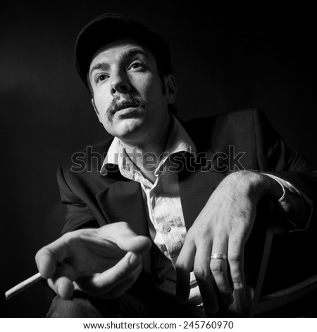 puzzled man with a cigarette