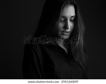 The sad young woman. black and white