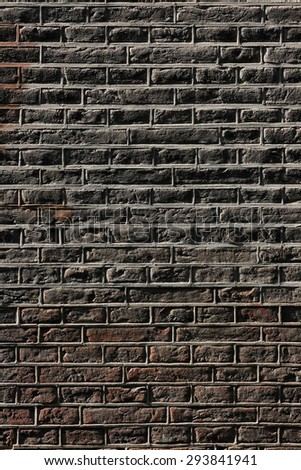 Brick wall. Amsterdam\'s traditional brickwork made of black bricks.