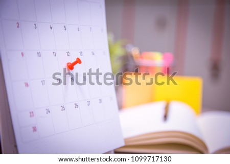 Calendar Event Planner is busy.calendar,clock to set timetable organize schedule,planning for business meeting or travel planning concept.