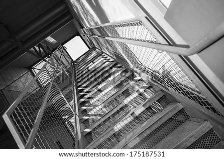 Steel staircase which leads to the upper level, nice simple lines, clean & very sturdy.