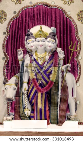 Dattatreya idol in Hindu temple. Dattatreya is considered to be an avatar of the three Hindu gods Brahma, Vishnu, and Shiva. Seekers pray to this Supreme Teacher for knowledge of the Absolute Truth.