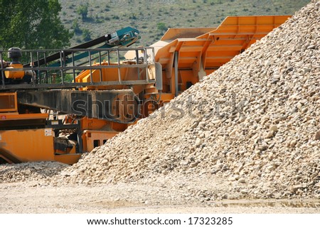 Excavator working in a gravel pit