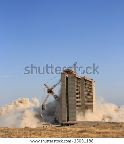 Explosion demolishing a city building