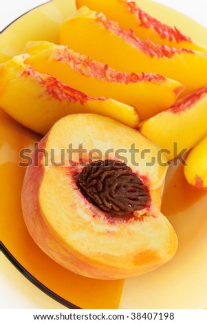 Sliced peaches in dish