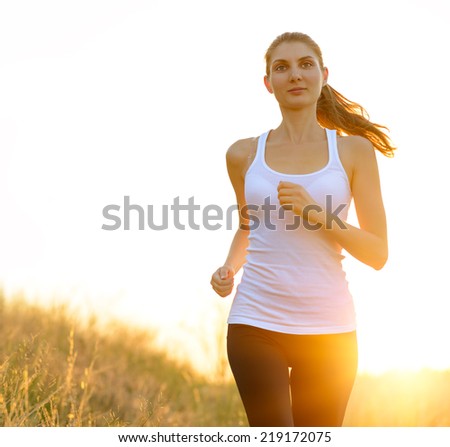 Young Beautiful Woman Running on the Trail in the Morning. Active Lifestyle