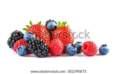Big Pile of Fresh Berries on the White Background. Ripe Sweet Strawberry, Raspberry, Blueberry, Blackberry