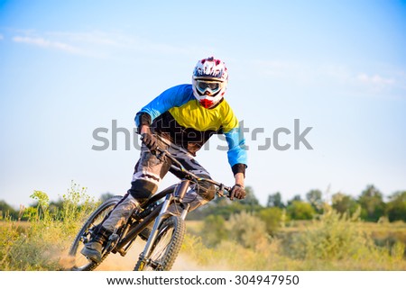 Cyclist Riding the Mountain Bike on the Trail. Extreme Sport Concept