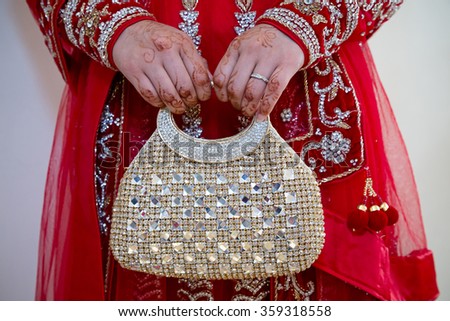 bride holding her clutch bag