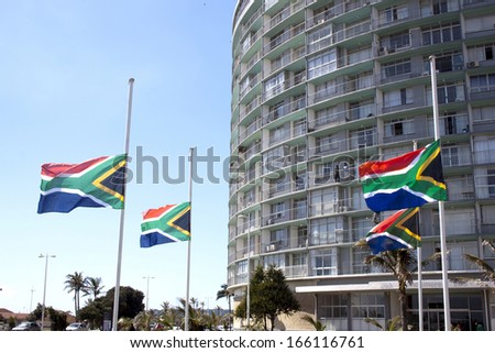 Durban, South Africa - December 6, 2013: South African Flags Flying At Half-Mast In Honor Of Nelson Mandela In Durban, South Africa, December 6, 2013.