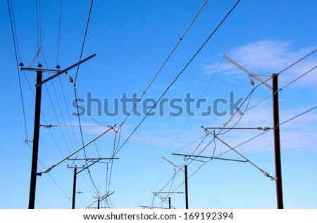 overhead power lines providing power to electric trains
